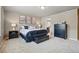 Comfortable main bedroom featuring carpeted floors and a king-sized bed at 15275 W La Salle Ave, Lakewood, CO 80228