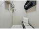 Functional mud room features built-in bench, storage shelves, and convenient coat hooks at 15275 W La Salle Ave, Lakewood, CO 80228