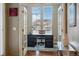 Charming office space with natural light, French doors, and a view of the outdoors at 15275 W La Salle Ave, Lakewood, CO 80228