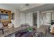 Finished basement area with a cozy seating arrangement and modern decor at 1163 Highview Dr, Erie, CO 80516