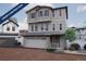 Charming new two-story home featuring an attached two-car garage and landscaped front yard at 1163 Highview Dr, Erie, CO 80516