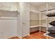 Walk-in closet with adjustable shelving at 7649 Pineridge Ter, Castle Pines, CO 80108