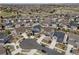 Aerial view of a suburban neighborhood showing the layout and proximity to other homes at 23879 E Narrowleaf Pl, Aurora, CO 80016