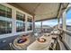 Outdoor deck featuring dining area and lounge seating with string lights above at 23879 E Narrowleaf Pl, Aurora, CO 80016