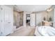 Bright bathroom with a separate shower, soaking tub, white tiled floors and ample space to move around at 23879 E Narrowleaf Pl, Aurora, CO 80016