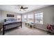 bedroom featuring a single bed, neutral walls and lots of natural light from the multiple windows at 23879 E Narrowleaf Pl, Aurora, CO 80016