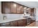 Well-equipped kitchen featuring stainless steel appliances, ample cabinet space, and modern countertops at 23879 E Narrowleaf Pl, Aurora, CO 80016