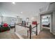 Upstairs loft area with cozy seating, neutral walls and natural light from a window, plus bedroom views at 23879 E Narrowleaf Pl, Aurora, CO 80016