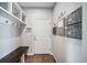 Mud room with storage shelves, hooks, and a bench for convenience at 23879 E Narrowleaf Pl, Aurora, CO 80016