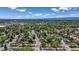 Spacious property with surrounding greenery and neighborhood, offering a serene living environment at 8272 Ammons Cir, Arvada, CO 80005