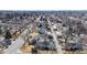 Aerial view of neighborhood featuring tree-lined streets and well-maintained homes at 6330 E 13Th Ave, Denver, CO 80220