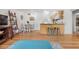 Open living space with kitchen, breakfast nook, and hardwood flooring at 6330 E 13Th Ave, Denver, CO 80220