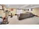 Finished basement with entertainment area and exercise equipment. Theater screen shown at 48155 E 56Th Ave, Bennett, CO 80102