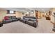 Spacious finished basement with comfortable seating and ample room for entertainment at 48155 E 56Th Ave, Bennett, CO 80102