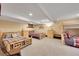 Basement bedroom with multiple beds, bunk bed, and wood furnishings at 48155 E 56Th Ave, Bennett, CO 80102