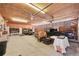 Oversized garage featuring ample storage space, work area, and room for parking multiple vehicles at 48155 E 56Th Ave, Bennett, CO 80102