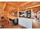 Stylish kitchen featuring a large island, granite countertops, and modern appliances at 48155 E 56Th Ave, Bennett, CO 80102