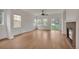 Spacious living room featuring a fireplace, hardwood floors, and sliding doors to the backyard at 3186 Springmeadow Cir, Castle Rock, CO 80109