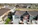 Aerial view of attractive townhomes featuring coordinated colors and well-maintained lawns at 9756 Ash Ln, Thornton, CO 80229