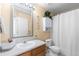 Full bathroom with single sink and vanity, shower/tub combo, and neutral color scheme at 2231 E 128Th Ave, Thornton, CO 80241