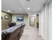 Hallway view with neutral carpet, paint, recessed lights and access to multiple rooms at 2231 E 128Th Ave, Thornton, CO 80241