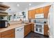 Kitchen area with stainless steel appliances and lighter colored cabinets at 2231 E 128Th Ave, Thornton, CO 80241
