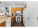 Cozy kitchen with modern appliances and bright lighting at 2231 E 128Th Ave, Thornton, CO 80241