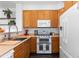 Beautiful kitchen showcasing modern appliances and light-colored cabinets at 2231 E 128Th Ave, Thornton, CO 80241