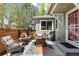 Outdoor patio seating area featuring a fire pit, grill, and privacy fence at 2231 E 128Th Ave, Thornton, CO 80241