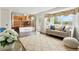Open-concept living area with hardwood floors and a view of the kitchen at 4873 Eckert St, Castle Rock, CO 80104