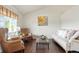 Bright living room with stylish furnishings and ample natural light at 4873 Eckert St, Castle Rock, CO 80104