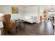 Spacious living area with hardwood floors and a calming color palette at 4873 Eckert St, Castle Rock, CO 80104