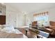 Comfortable living room with hardwood floors and a neutral color scheme at 4873 Eckert St, Castle Rock, CO 80104