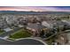 Aerial view of the neighborhood and house features a well-manicured lawn and fenced backyard at 15994 La Plata Peak Pl, Broomfield, CO 80023