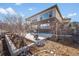 The backyard patio area has nice landscaping and room for a fire pit at 15994 La Plata Peak Pl, Broomfield, CO 80023
