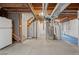 Unfinished basement with exposed ducts and beams offer customization and extra storage space at 13245 Shoshone St, Denver, CO 80234