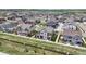 Overhead view of a residential neighborhood with well-maintained homes and green spaces at 14096 Red Cosmos St, Parker, CO 80134
