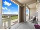 Covered porch with seating offering scenic views, perfect for relaxing outdoors in a comfortable setting at 14096 Red Cosmos St, Parker, CO 80134