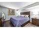 Comfortable bedroom features a large bed and scenic views of the forest at 5724 Highway 9, Breckenridge, CO 80424