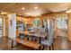 Charming dining space featuring a rustic wood table, modern chairs, and natural light from nearby windows at 5724 Highway 9, Breckenridge, CO 80424