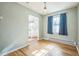 Comfortable dining area with hardwood floors, a window, and easy access to the kitchen at 2858 Jasmine St, Denver, CO 80207