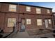 Brick apartment building featuring multiple windows and a secure door at 2858 Jasmine St, Denver, CO 80207