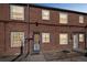 Brick apartment building featuring multiple windows and a secure door at 2858 Jasmine St, Denver, CO 80207