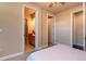 Cozy bedroom with view of ensuite bathroom and closet at 1735 N Ogden St # 106, Denver, CO 80218