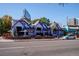 Unique purple building with an eye-catching design and outdoor seating, creating a vibrant and inviting dining atmosphere at 1735 N Ogden St # 106, Denver, CO 80218