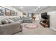 Basement with sectional, TV, and pool table, perfect for entertaining and relaxation at 3234 El Charro Pt, Castle Rock, CO 80108