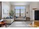 Bright and airy living room featuring neutral tones, plush sofas, and large windows for natural light at 3234 El Charro Pt, Castle Rock, CO 80108