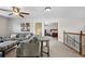 Upstairs living room area with carpeting and furniture at 3234 El Charro Pt, Castle Rock, CO 80108