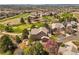 Beautiful aerial view of the home, golf course, and surrounding neighborhood at 6462 S Versailles Ct, Aurora, CO 80016