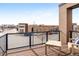 Relaxing patio area with metal railing and furniture, overlooking the neighborhood at 10305 Martin Luther King Blvd, Denver, CO 80238